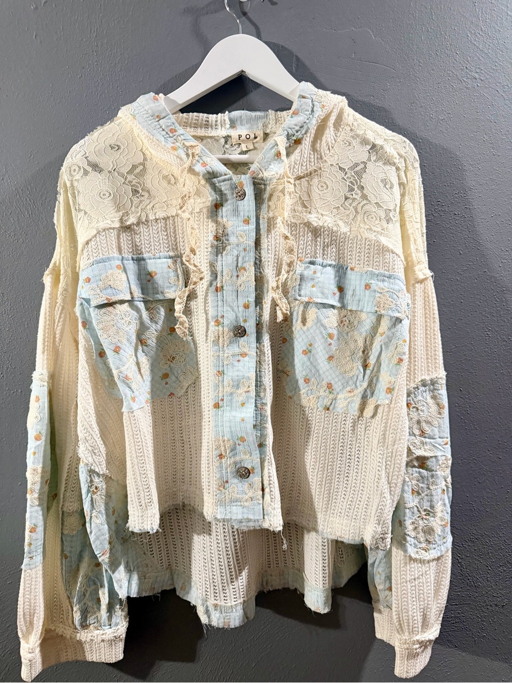 NWOT. POL Cream Knit Button-Front Top with Light Blue Floral Patches